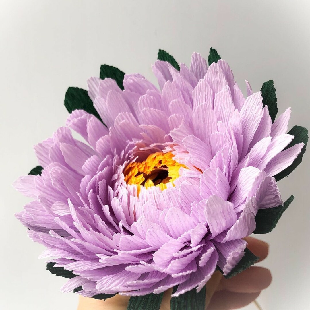 Sådan laver du smukke blomster af bølgepapir