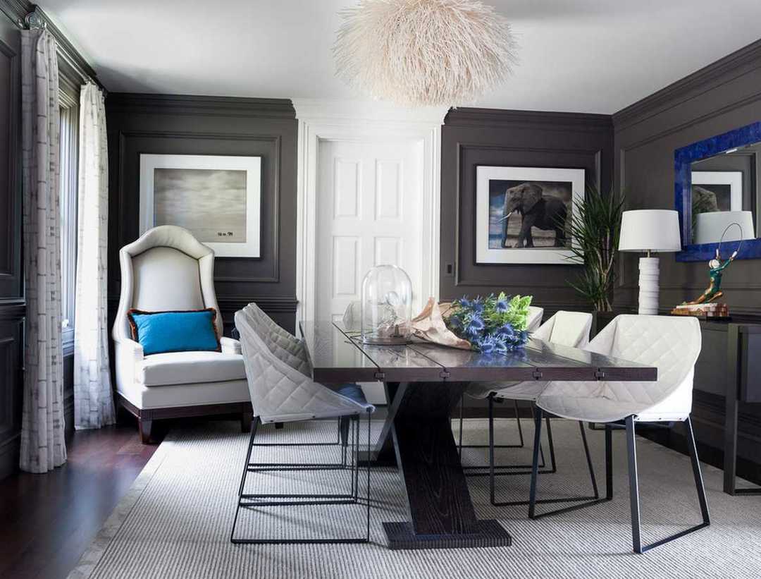Dizajn bytu v sivých tónoch: krásny interiér v šedej a bielej farbe s laminátovou fotografiou