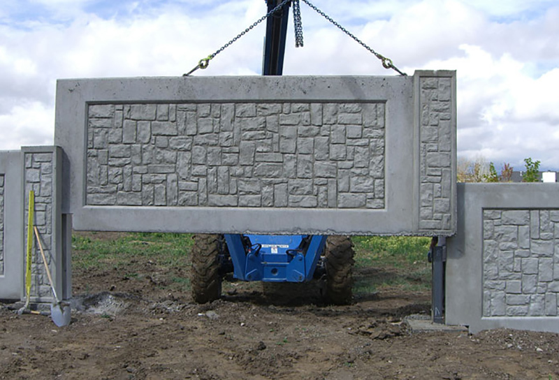 Installing a section of a concrete fence