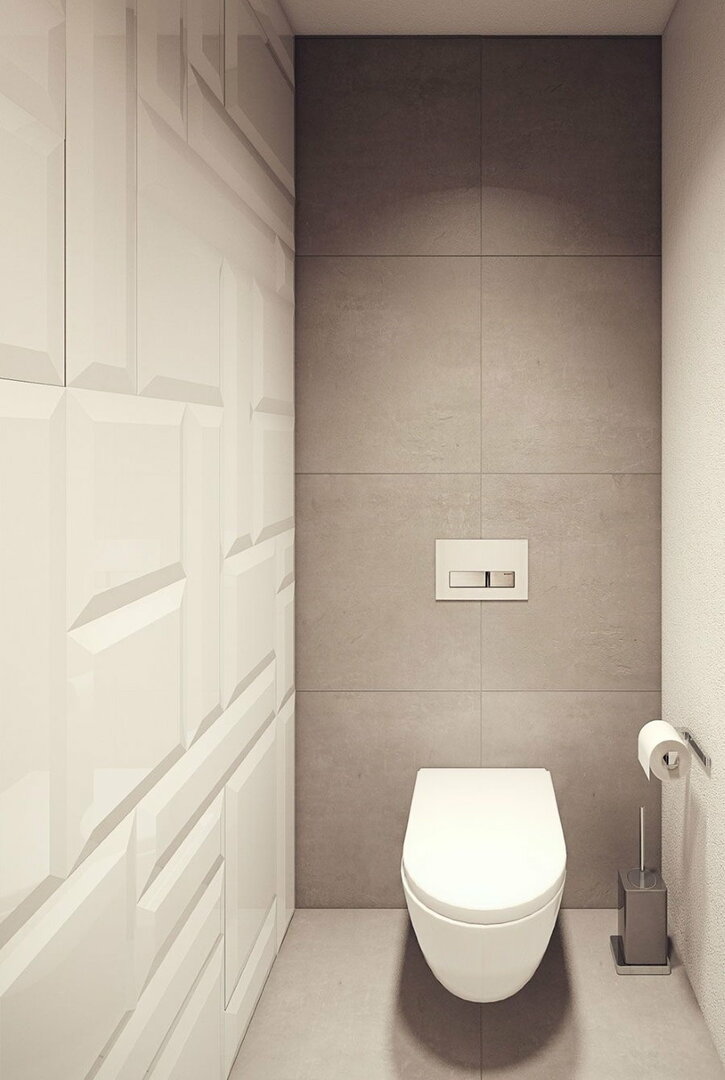 Valge seinale paigaldatud tualett kaasaegses tualetis